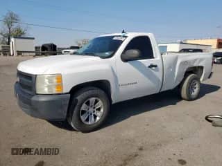 2007 Chevrolet Silverado 1500 Work Truck with VIN 1GCEC14X77Z622918, listed as a Copart auction lot 70034695 with 294,552 mi miles and Salvage title. Bid and sale history available at DreamBid. Image 1.