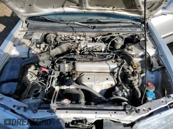 1997 Honda Accord LX with VIN 1HGCD5630VA809341, listed as a Copart auction lot 54182105 with 223,707 mi miles and Salvage title. Bid and sale history available at DreamBid. Image 11.