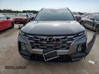 2024 Hyundai Santa Cruz Night Edition с VIN 5NTJCDAF1RH097328, выставлен на аукционе Copart как лот 70305814 с пробегом 461 миль миль и На запчасти • Non repairable. История ставок и продаж доступна на DreamBid. Изображение 5.