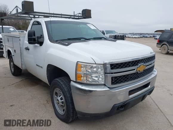 2012 Chevrolet Silverado 2500HD Work Truck z VIN 1GB0CVCG3CF144998, wystawiony jako IAAI lot #41381779 z przebiegiem 356 380 mil mil oraz . Historia ofert i sprzedaży dostępna na DreamBid. Obrazek 1.