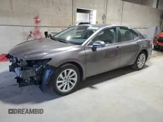 2022 Toyota Camry LE с VIN 4T1R11AK5NU070454, выставлен на аукционе Copart как лот 83792995 с пробегом 27 507 миль миль и Списание • Salvage title. История ставок и продаж доступна на DreamBid. Изображение 1.