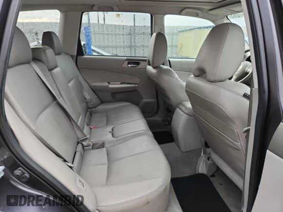 2009 Subaru Forester X Limited с VIN JF2SH64659H738296, выставлен на аукционе Copart как лот 70517095 с пробегом 168 485 миль миль и Списание • Salvage title. История ставок и продаж доступна на DreamBid. Изображение 11.