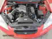 2010 Hyundai Genesis Coupe z VIN KMHHU6KH5AU019372, wystawiony jako Copart lot #82832154 z przebiegiem 108 628 mil mil oraz Szkoda całkowita • Salvage title. Historia ofert i sprzedaży dostępna na DreamBid. Obrazek 11.