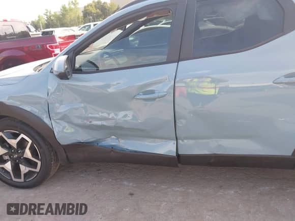 2024 Hyundai Santa Cruz Limited with VIN 5NTJEDAF9RH080030, listed as a IAAI auction lot 43289374 with 10,767 mi miles and . Bid and sale history available at DreamBid. Image 6.