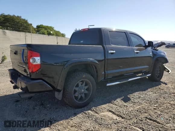2015 Toyota Tundra 1794 Edition with VIN 5TFAW5F14FX485999, listed as a Copart auction lot 82696155 with 92,982 mi miles and Salvage title. Bid and sale history available at DreamBid. Image 3.