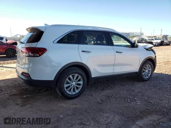 2018 Kia Sorento LX z VIN 5XYPG4A3XJG413047, wystawiony jako Copart lot #82176955 z przebiegiem 118 651 mil mil oraz Szkoda całkowita • Salvage title. Historia ofert i sprzedaży dostępna na DreamBid. Obrazek 3.