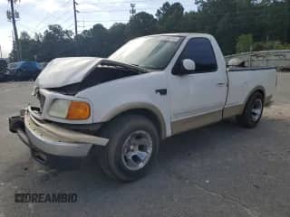1999 Ford F-150 XL z VIN 1FTRF17L8XNA75702, wystawiony jako Copart lot #69868104 z przebiegiem Nie podano mil oraz Szkoda całkowita • Salvage title. Historia ofert i sprzedaży dostępna na DreamBid. Obrazek 1.