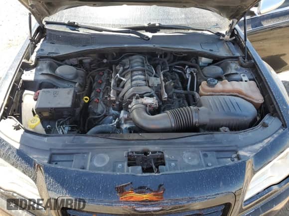 2013 Chrysler 300 C с VIN 2C3CCAET9DH523682, выставлен на аукционе Copart как лот 70926075 с пробегом 99 979 миль миль и Списание • Salvage title. История ставок и продаж доступна на DreamBid. Изображение 11.