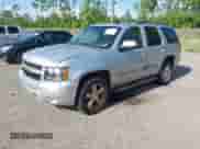 2013 Chevrolet Tahoe LT with VIN 1GNSKBE04DR255492, listed as a IAAI auction lot 42795132 with 288,535 mi miles and . Bid and sale history available at DreamBid. Image 2.