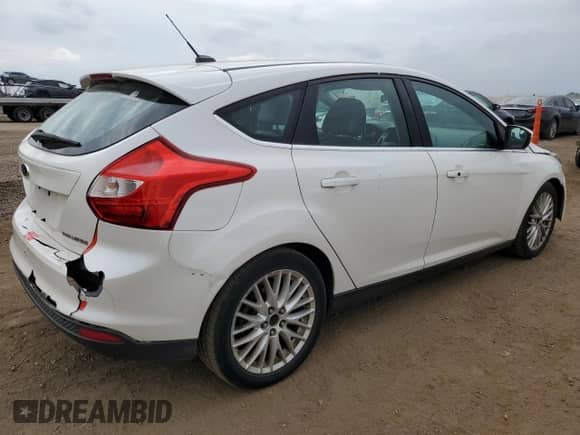 2013 Ford Focus Titanium z VIN 1FADP3N25DL132299, wystawiony jako Copart lot #70143575 z przebiegiem 158 329 mil mil oraz Szkoda całkowita • Salvage title. Historia ofert i sprzedaży dostępna na DreamBid. Obrazek 3.