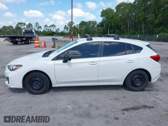 2018 Subaru Impreza with VIN 4S3GTAA65J3701017, listed as a IAAI auction lot 42827533 with 109,708 mi miles and . Bid and sale history available at DreamBid. Image 15.