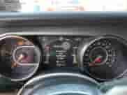 2022 Jeep Wrangler Unlimited Sahara with VIN 1C4HJXENXNW244773, listed as a Copart auction lot 59694095 with 21,871 mi miles and Salvage title. Bid and sale history available at DreamBid. Image 9.