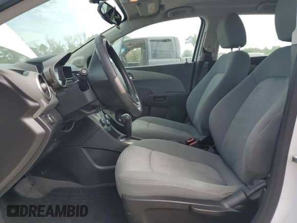 2014 Chevrolet Sonic LS с VIN 1G1JA6SG1E4196568, выставлен на аукционе Copart как лот 70040385 с пробегом 73 621 миль миль и Списание • Salvage title. История ставок и продаж доступна на DreamBid. Изображение 7.