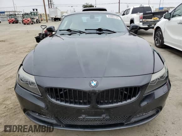 2012 BMW Z4 sDrive28i с VIN WBALL5C56CE716558, выставлен на аукционе Copart как лот 62003125 с пробегом 93 438 миль миль и Списание • Salvage title. История ставок и продаж доступна на DreamBid. Изображение 5.