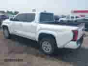 2025 Toyota Tacoma SR with VIN 3TMLB5JN0SM110089, listed as a IAAI auction lot 43218799 with 19,573 mi miles and . Bid and sale history available at DreamBid. Image 3.