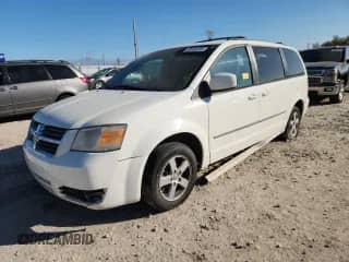 2010 Dodge Grand Caravan SXT z VIN 2D4RN5D10AR202081, wystawiony jako Copart lot #89920235 z przebiegiem 191 556 mil mil oraz Czysty tytuł • Clean title. Historia ofert i sprzedaży dostępna na DreamBid. Obrazek 1.