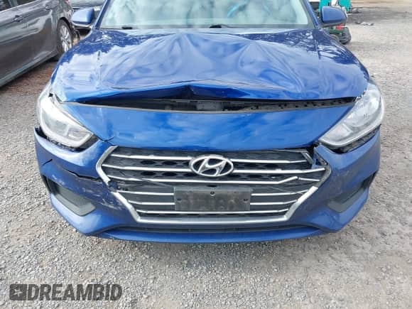 2021 Hyundai Accent SE z VIN 3KPC24A62ME140629, wystawiony jako IAAI lot #43477005 z przebiegiem 132 812 mil mil oraz . Historia ofert i sprzedaży dostępna na DreamBid. Obrazek 6.