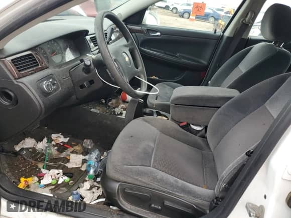 2014 Chevrolet Impala LS с VIN 2G1WA5E34E1136806, выставлен на аукционе Copart как лот 81473375 с пробегом 169 221 миль миль и Списание • Salvage title. История ставок и продаж доступна на DreamBid. Изображение 7.