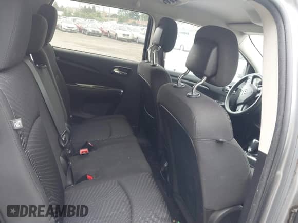 2017 Dodge Journey SXT with VIN 3C4PDDBG8HT577782, listed as a IAAI auction lot 42409731 with 136,618 mi miles and . Bid and sale history available at DreamBid. Image 8.