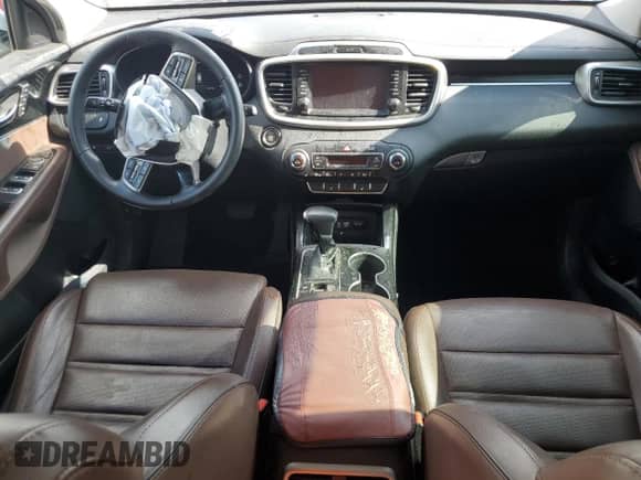 2020 Kia Sorento SX z VIN 5XYPK4A55LG707958, wystawiony jako Copart lot #63341485 z przebiegiem 96 736 mil mil oraz Szkoda całkowita • Salvage title. Historia ofert i sprzedaży dostępna na DreamBid. Obrazek 8.