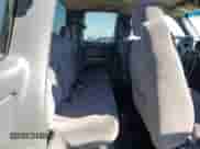 2002 GMC Sierra 1500 SLE z VIN 2GTEK19T421149196, wystawiony jako Copart lot #90694535 z przebiegiem 246 709 mil mil oraz Szkoda całkowita • Salvage title. Historia ofert i sprzedaży dostępna na DreamBid. Obrazek 10.