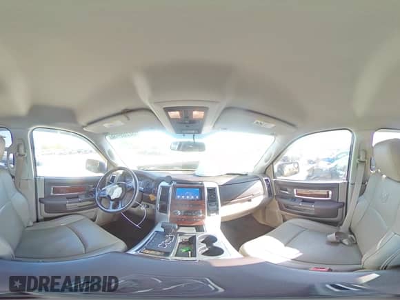 2012 Ram 1500 Laramie z VIN 1C6RD6NT9CS232971, wystawiony jako Copart lot #52209405 z przebiegiem 115 422 mil mil oraz Szkoda całkowita • Salvage title. Historia ofert i sprzedaży dostępna na DreamBid. Obrazek 12.