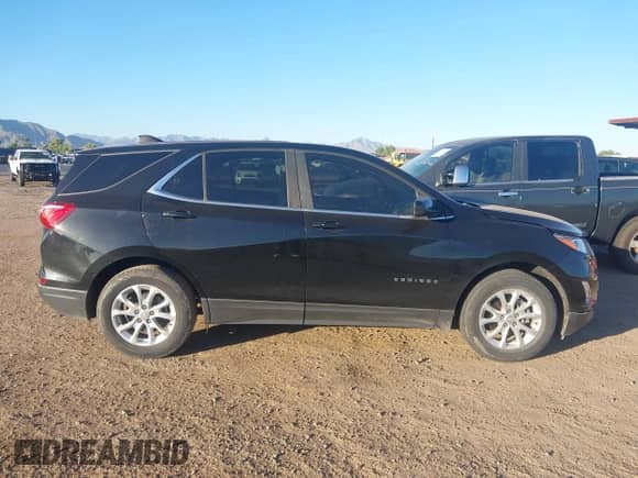 2021 Chevrolet Equinox LT z VIN 3GNAXKEV2ML401632, wystawiony jako IAAI lot #43182422 z przebiegiem 59 429 mil mil oraz . Historia ofert i sprzedaży dostępna na DreamBid. Obrazek 13.