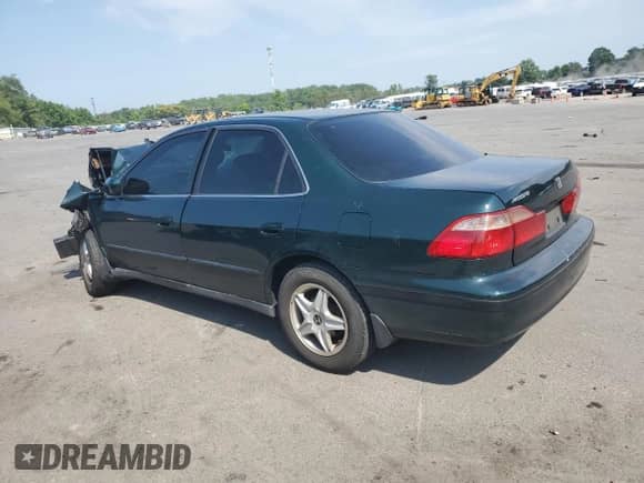 1999 Honda Accord LX with VIN 1HGCG1648XA061854, listed as a Copart auction lot 62278035 with Not provided miles and Salvage title. Bid and sale history available at DreamBid. Image 2.