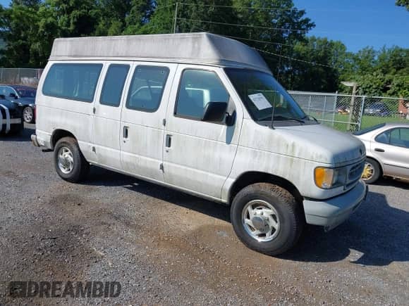 2002 Ford Econoline Cargo with VIN 1FTNE242X2HA90857, listed as a IAAI auction lot 42716391 with 103,796 mi miles and . Bid and sale history available at DreamBid. Image 1.