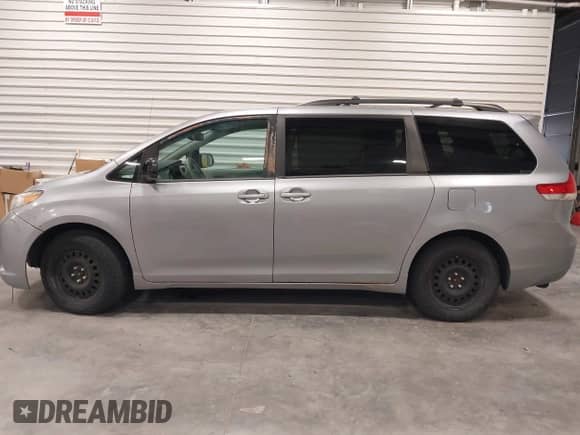 2013 Toyota Sienna LE with VIN 5TDJK3DC5DS051372, listed as a IAAI auction lot 42313353 with 174,638 mi miles and . Bid and sale history available at DreamBid. Image 14.