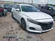 2022 Honda Accord EX-L z VIN 1HGCV3F52NA028145, wystawiony jako IAAI lot #42392540 z przebiegiem 51 454 mil mil oraz . Historia ofert i sprzedaży dostępna na DreamBid. Obrazek 1.