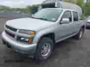 2011 Chevrolet Colorado 1LT z VIN 1GCHTCFE4B8111542, wystawiony jako IAAI lot #42168554 z przebiegiem 79 611 mil mil oraz . Historia ofert i sprzedaży dostępna na DreamBid. Obrazek 17.