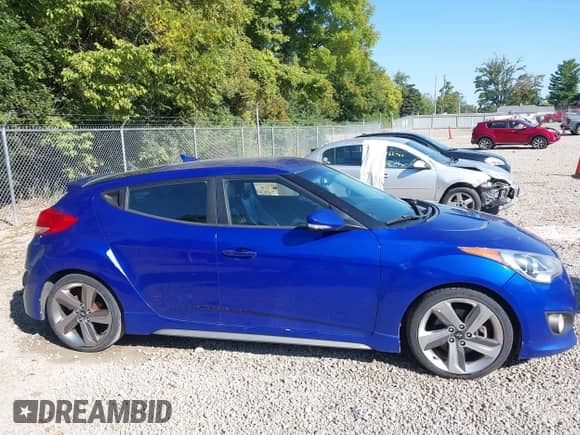 2013 Hyundai Veloster Turbo с VIN KMHTC6AE7DU140638, выставлен на аукционе IAAI как лот 43169612 с пробегом 162 811 миль миль и . История ставок и продаж доступна на DreamBid. Изображение 13.