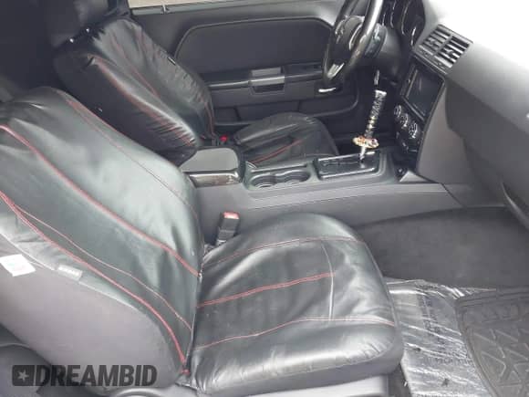 2014 Dodge Challenger R/T Plus with VIN 2C3CDYBT1EH177266, listed as a IAAI auction lot 41798977 with 109,489 mi miles and . Bid and sale history available at DreamBid. Image 5.