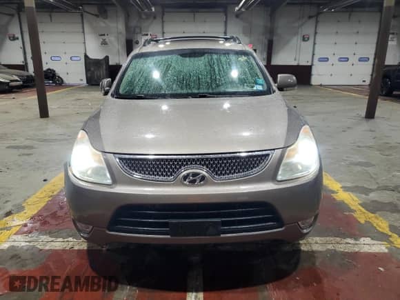 2011 Hyundai Veracruz GLS z VIN KM8NU4CC2BU140422, wystawiony jako Copart lot #84294914 z przebiegiem 181 866 mil mil oraz Szkoda całkowita • Salvage title. Historia ofert i sprzedaży dostępna na DreamBid. Obrazek 5.
