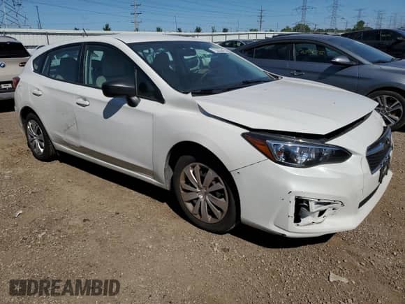 2018 Subaru Impreza с VIN 4S3GTAA66J3705898, выставлен на аукционе Copart как лот 70363645 с пробегом 68 116 миль миль и Списание • Salvage title. История ставок и продаж доступна на DreamBid. Изображение 4.