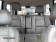 2002 Hyundai Santa Fe GLS z VIN KM8SC73D22U153199, wystawiony jako Copart lot #86425594 z przebiegiem 252 992 mil mil oraz Nie do naprawy • Non repairable. Historia ofert i sprzedaży dostępna na DreamBid. Obrazek 10.