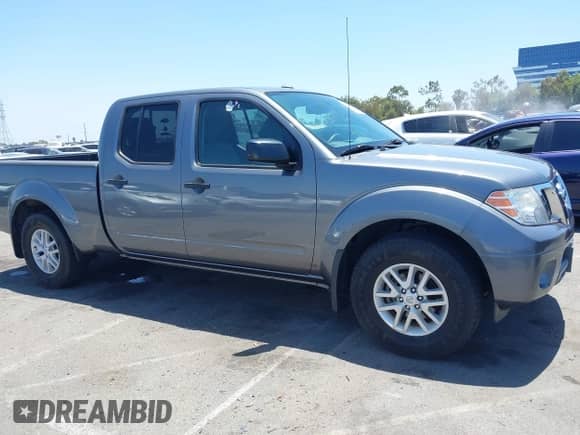 2017 Nissan Frontier SV z VIN 1N6AD0FR8HN757402, wystawiony jako IAAI lot #42509323 z przebiegiem 66 306 mil mil oraz . Historia ofert i sprzedaży dostępna na DreamBid. Obrazek 13.