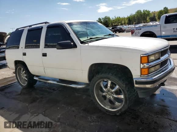 1997 Chevrolet Tahoe с VIN 1GNEK13R6VJ351228, выставлен на аукционе Copart как лот 62229284 с пробегом 171 043 миль миль и Списание • Salvage title. История ставок и продаж доступна на DreamBid. Изображение 4.