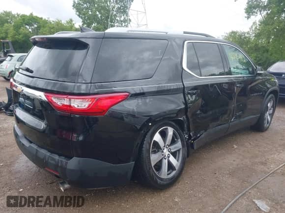 2018 Chevrolet Traverse LT with VIN 1GNERHKW5JJ235542, listed as a IAAI auction lot 42295482 with 150,646 mi miles and . Bid and sale history available at DreamBid. Image 4.