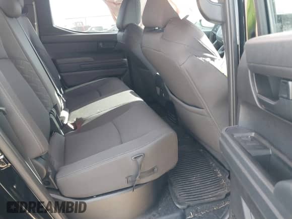 2024 Toyota Tacoma SR with VIN 3TYKD5HN5RT003937, listed as a IAAI auction lot 41339802 with 13,117 mi miles and . Bid and sale history available at DreamBid. Image 8.
