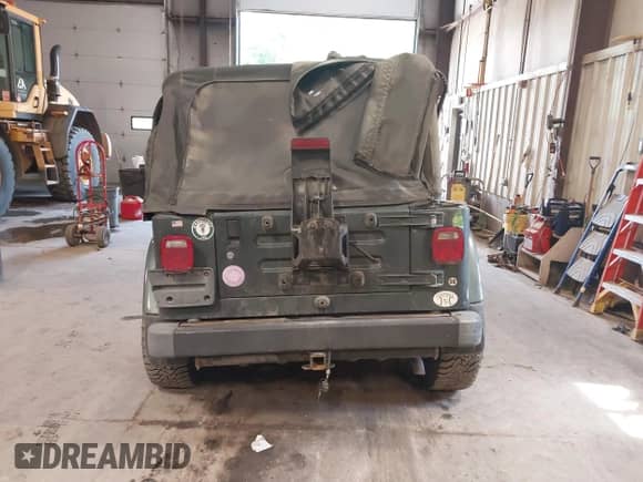 2003 Jeep Wrangler Sahara с VIN 1J4FA59S73P307373, выставлен на аукционе IAAI как лот 42542540 с пробегом 131 112 миль миль и . История ставок и продаж доступна на DreamBid. Изображение 16.