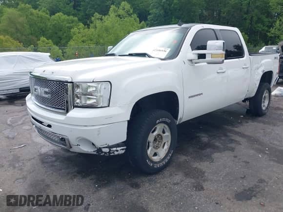 2010 GMC Sierra 1500 SLT with VIN 3GTRKWE37AG184132, listed as a IAAI auction lot 42106936 with 243,711 mi miles and . Bid and sale history available at DreamBid. Image 2.