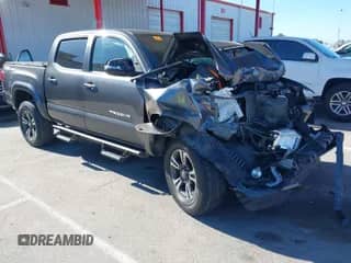 2017 Toyota Tacoma SR5 with VIN 3TMAZ5CN3HM032609, listed as a IAAI auction lot 43024966 with 95,791 mi miles and . Bid and sale history available at DreamBid. Image 1.