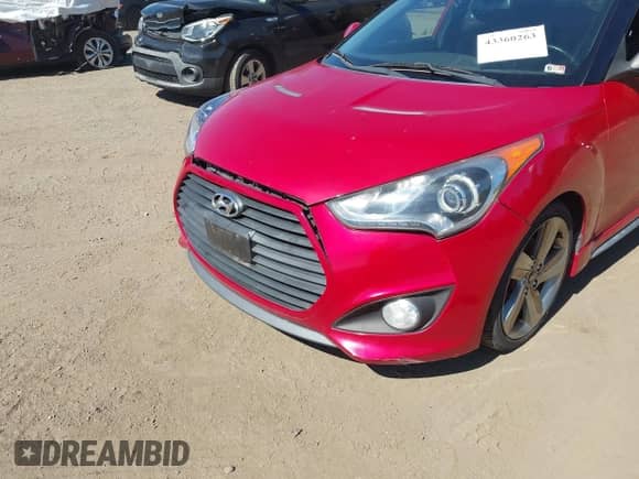 2013 Hyundai Veloster Turbo с VIN KMHTC6AE2DU164913, выставлен на аукционе IAAI как лот 43360263 с пробегом 166 585 миль миль и . История ставок и продаж доступна на DreamBid. Изображение 6.