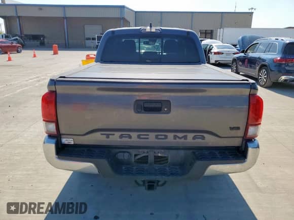 2021 Toyota Tacoma SR5 with VIN 3TMAZ5CN2MM159913, listed as a Copart auction lot 80368735 with 71,895 mi miles and Salvage title. Bid and sale history available at DreamBid. Image 6.