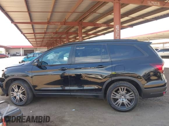 2022 Honda Pilot Sport with VIN 5FNYF6H38NB090932, listed as a IAAI auction lot 42654699 with Not provided miles and . Bid and sale history available at DreamBid. Image 13.
