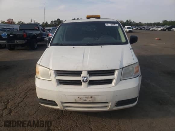 2010 Dodge Grand Caravan Cargo with VIN 2D4RN1AE6AR497042, listed as a Copart auction lot 71733084 with 174,555 mi miles and Salvage title. Bid and sale history available at DreamBid. Image 5.