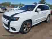 2015 Jeep Grand Cherokee SRT z VIN 1C4RJFDJ5FC647995, wystawiony jako IAAI lot #42276301 z przebiegiem 141 332 mil mil oraz . Historia ofert i sprzedaży dostępna na DreamBid. Obrazek 2.
