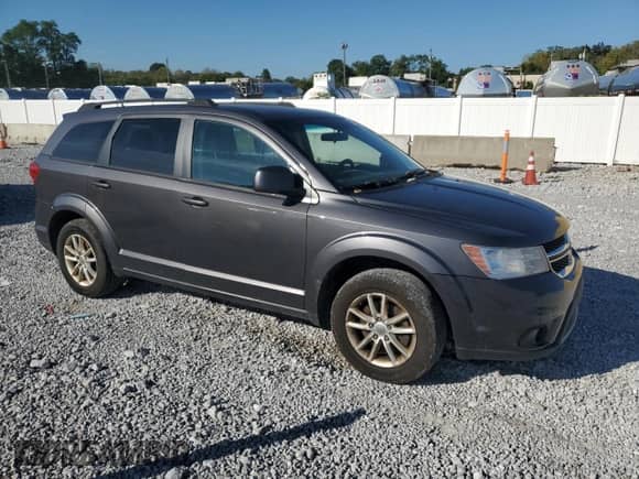 2014 Dodge Journey SXT with VIN 3C4PDCBG9ET142064, listed as a Copart auction lot 84588885 with 168,463 mi miles and Salvage title. Bid and sale history available at DreamBid. Image 4.